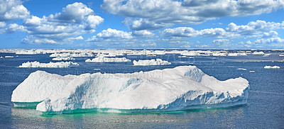 Buy stock photo Iceberg, seascape and ocean in Arctic for wallpaper, banner and clouds in Greenland. Global warming, ozone damage or climate change on Earth with CO2 effects, broken glacier or frozen water landscape