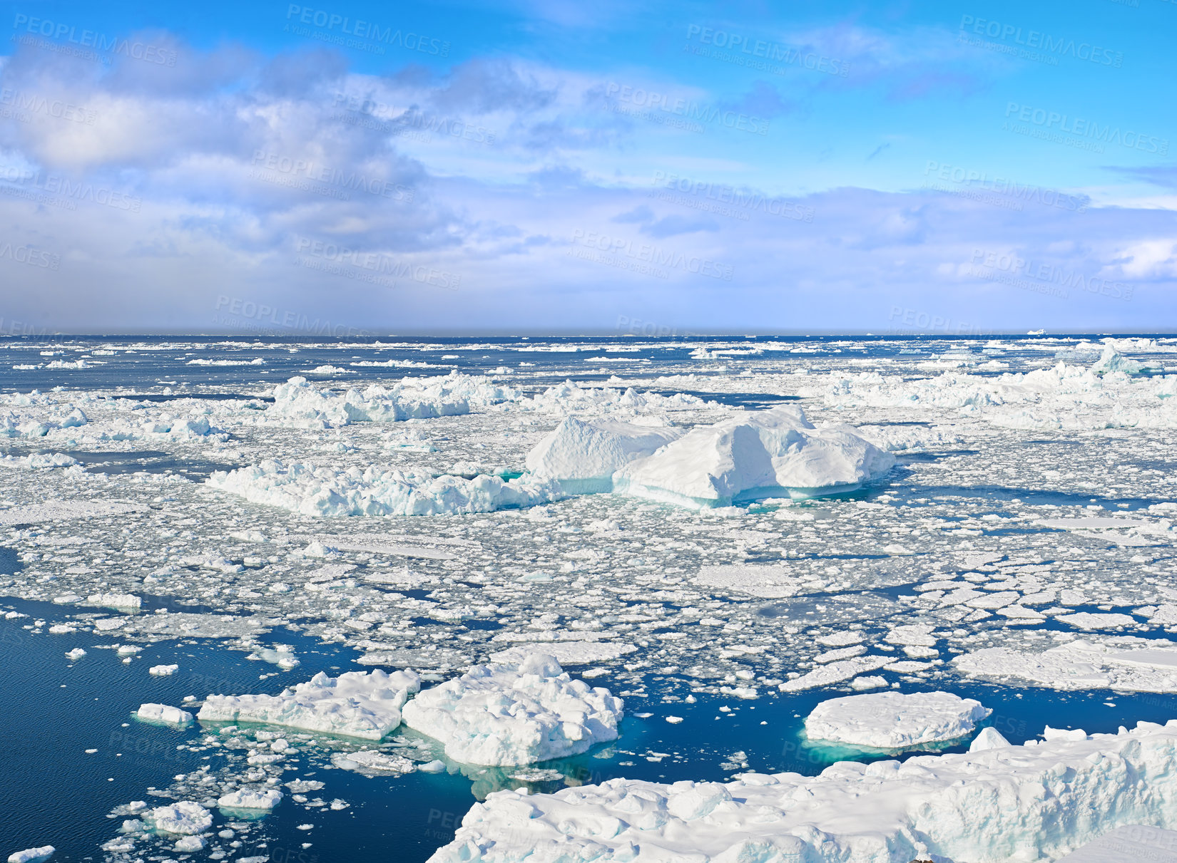 Buy stock photo Nature, iceberg or ocean water with snow, clouds or sky outdoor in Greenland. Arctic, sea or melting ice caps in environment with glacier for climate change crisis or global warming problem in winter