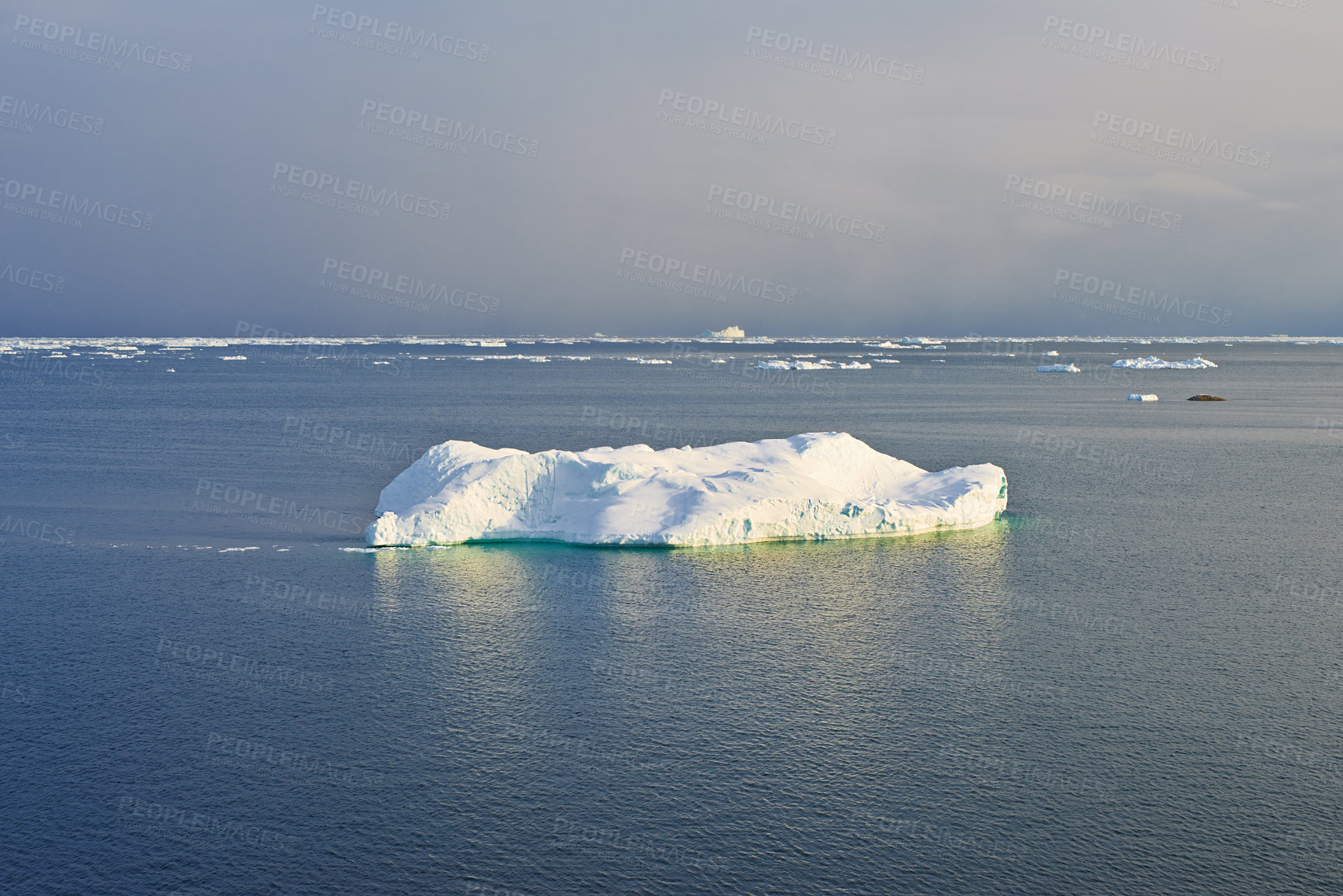 Buy stock photo Iceberg, seascape or water in Arctic for wallpaper, nature and view in Greenland. Global warming, melting ice and climate change on Earth with landscape, broken glacier and effects of CO2 emission