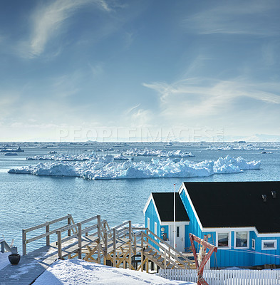 Buy stock photo Ice, house or seascape in day with iceberg, destination or tranquil scenery in Greenland. Cold, research facility or accommodation at Arctic pole for weather assessment, climate inspection or horizon