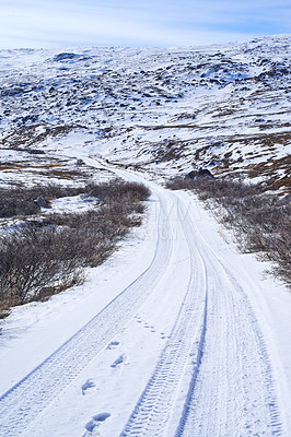 Buy stock photo Landscape, road and mountains with snow, winter and transportation in Kangerlussuaq, Greenland, Denmark. Nature, ice and highway by hill for infrastructure with horizon, travel or path in environment