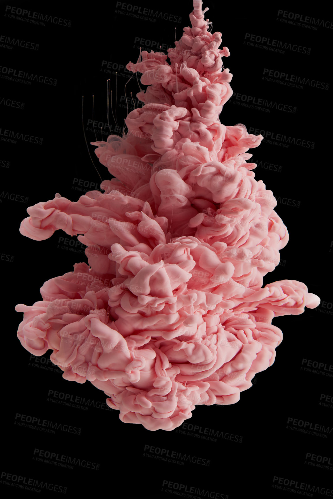 Buy stock photo Studio shot of peach ink in water against a black background