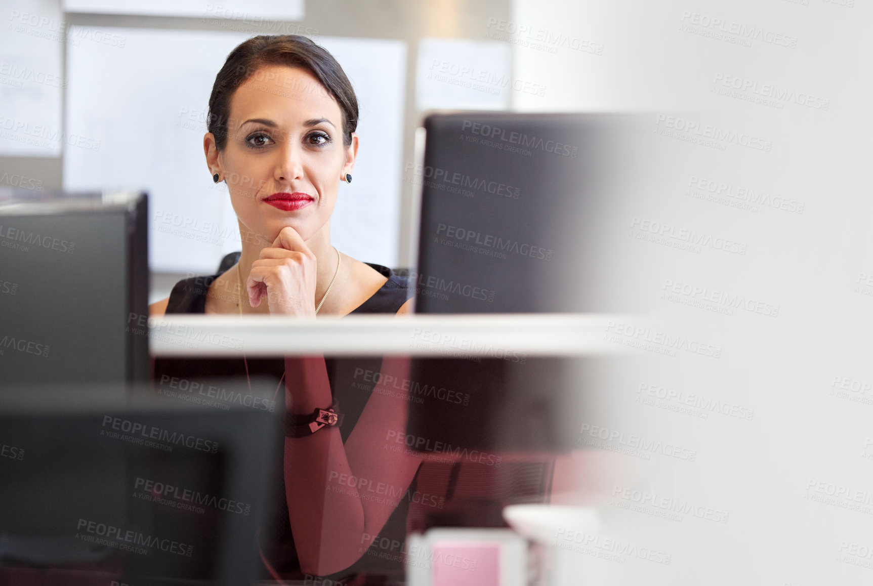 Buy stock photo Shot of a businesswoman at work in an office