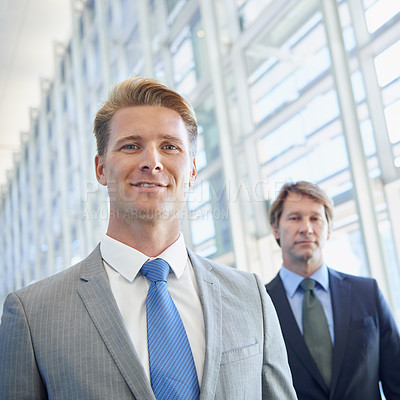 Buy stock photo Portrait, collaboration and business men walking in lobby of office together for corporate management. Face, company and confident partnership with professional team in workplace for career teamwork