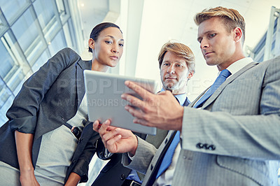 Buy stock photo Business people, tablet and discussion for project in office, collaboration and unity for proposal. Coworkers, workplace and teamwork for reading a report, support and online for plan and networking