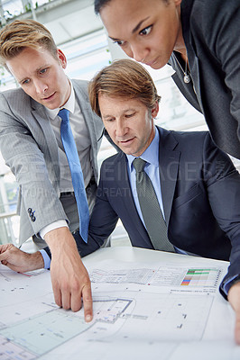 Buy stock photo Architecture, collaboration and planning with business people in office together for design. Building plans, blueprint and employee group of professional developer men and women meeting in workplace