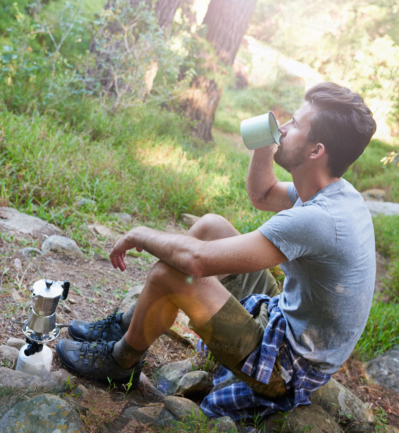 Buy stock photo Nature, coffee and man on hike in woods on break for workout, adventure or hobby outdoor. Journey, fitness and male athlete on trekking trip in forest drinking caffeine for energy on travel holiday
