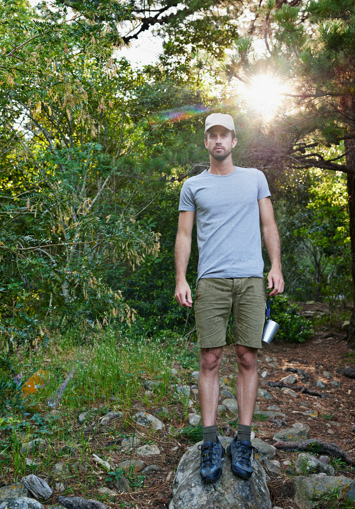 Buy stock photo Travel, hiking and portrait of man in forest outdoor for adventure, vacation and serious on holiday. Trekking, journey and confident person in woods for trip, tourism and explore nature in Australia