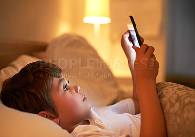 Buy stock photo Boy, tablet and bed with night, learning and technology for social media and growth. Child, bedroom and connectivity for knowledge, reading and elearning or internet surfing at home with touchscreen