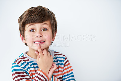 Buy stock photo Portrait, kid and boy thinking in studio isolated on a white background mockup space. Face, idea and young child with cute facial expression, innocent and casual clothes on a backdrop in Australia