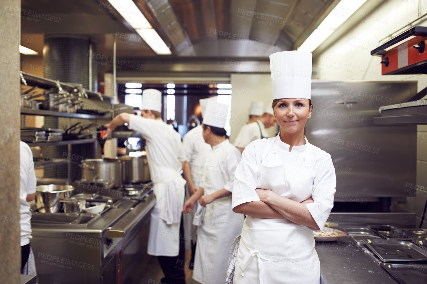 Buy stock photo Portrait of a chef in a professional kitchen