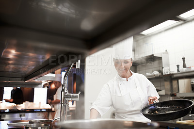 Buy stock photo Shot of the inner working of a professional kitchen