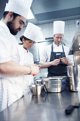 Buy stock photo Food, team and chef in kitchen for catering service, fine dining or delicious dish. Hospitality, equipment and group of employees with knife for cooking meal, preparation or dinner rush in restaurant