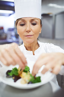 Buy stock photo Chef, plate and hands of woman in restaurant for catering service, fine dining or prepare dish. Hospitality, presentation and female person for cooking meal, food industry or dinner in kitchen