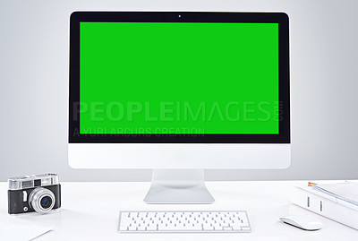 Buy stock photo Shot of a desktop PC with a green screen