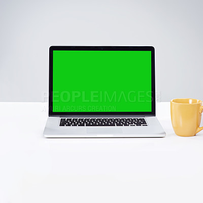 Buy stock photo Shot of a laptop with a green screen