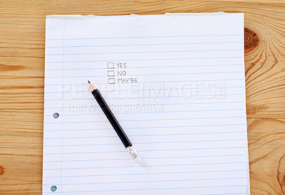 Buy stock photo A writing pad with the words yes, no and maybe in check boxes