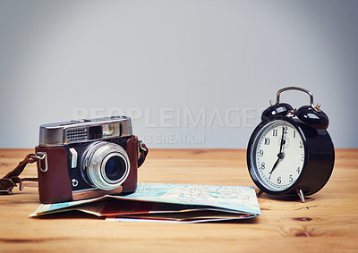 Buy stock photo Travel, map and clock with camera on table for itinerary schedule, adventure explore and direction. Mockup, photography and journey with vacation planning for tourism, navigation and discovery