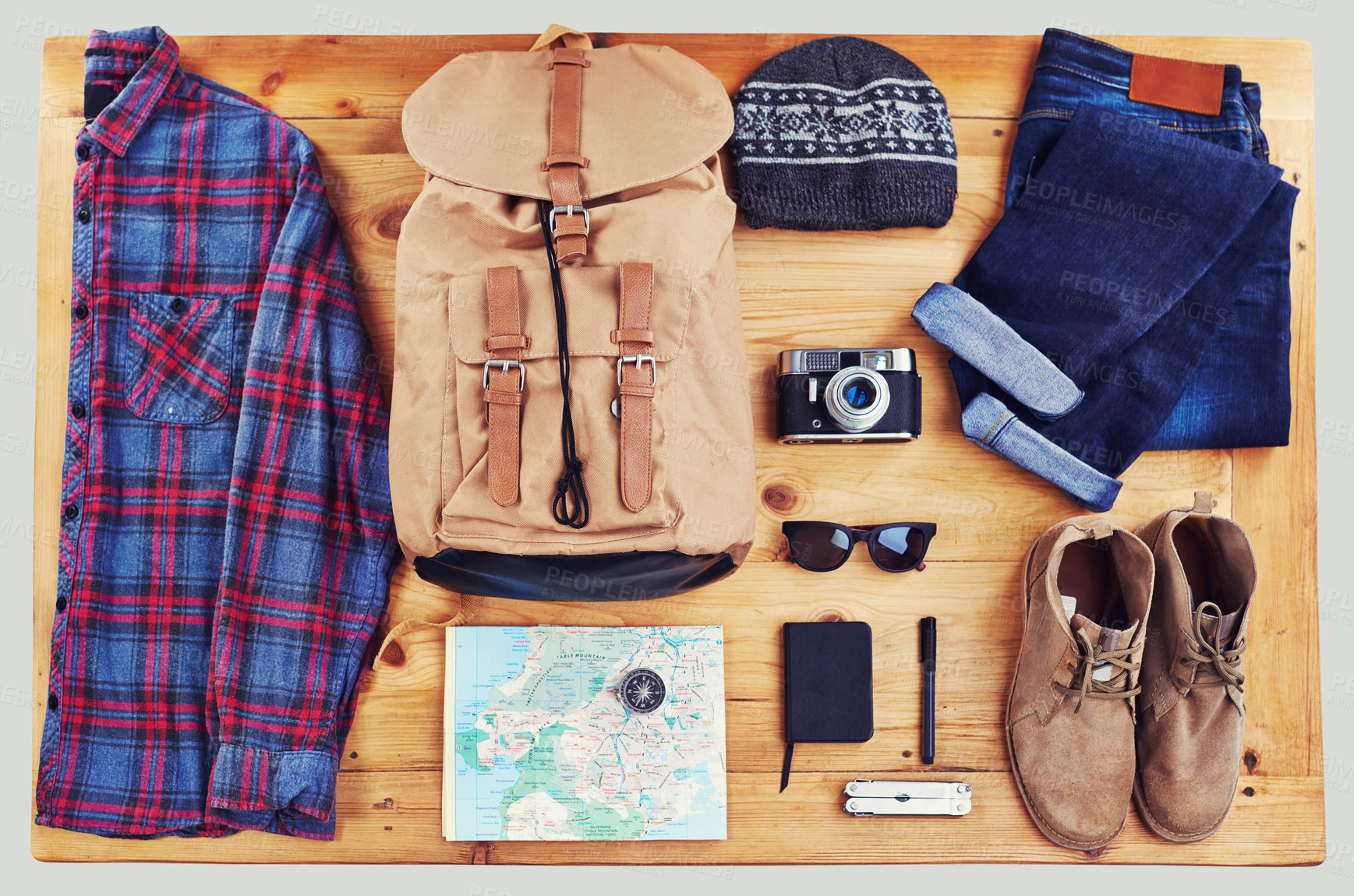 Buy stock photo High angle shot of hiking gear on a table top