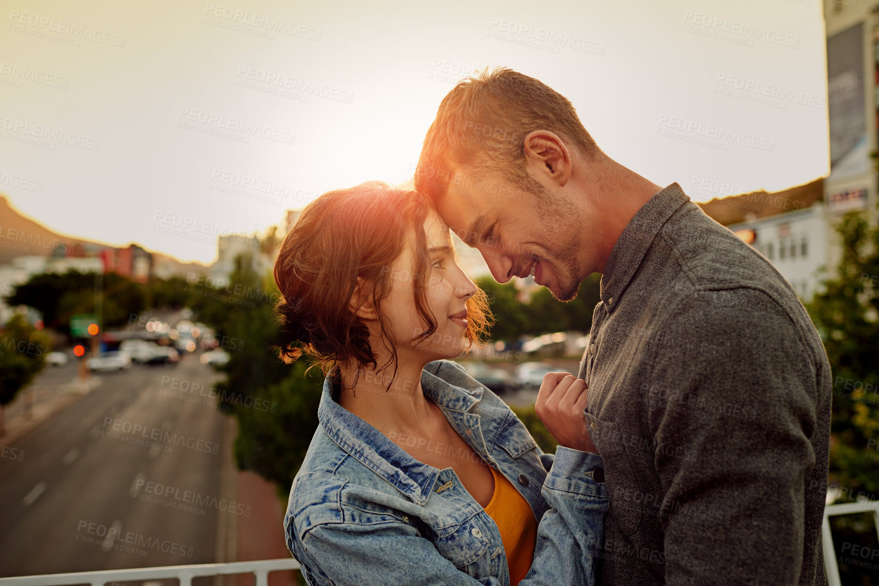 Buy stock photo Happy, couple and hug with love outdoor for vacation, honeymoon and bonding together in city. Smile, people and embracing with support for urban travel, healthy relationship and commitment of romance