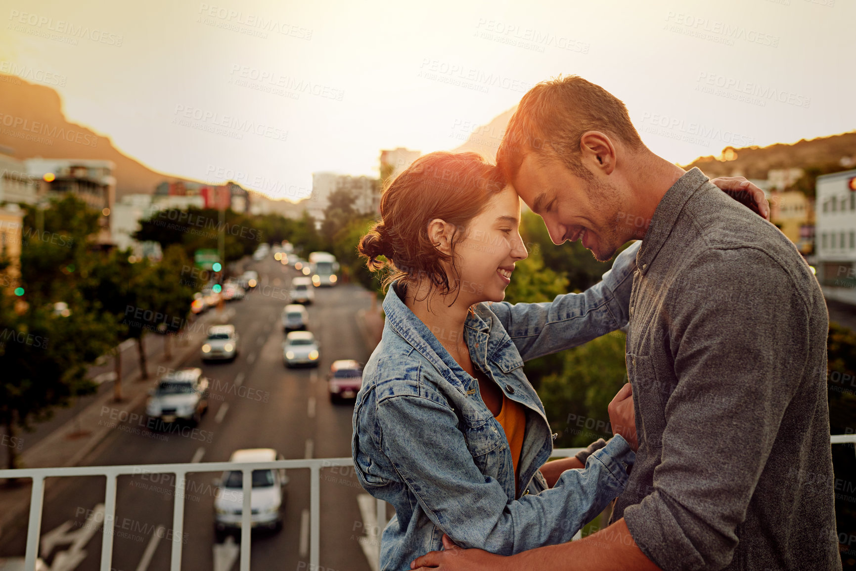 Buy stock photo Smile, couple and hug with love outdoor for vacation, honeymoon and bonding together in city. Happy, people and embracing with support for urban travel, healthy relationship and commitment of romance