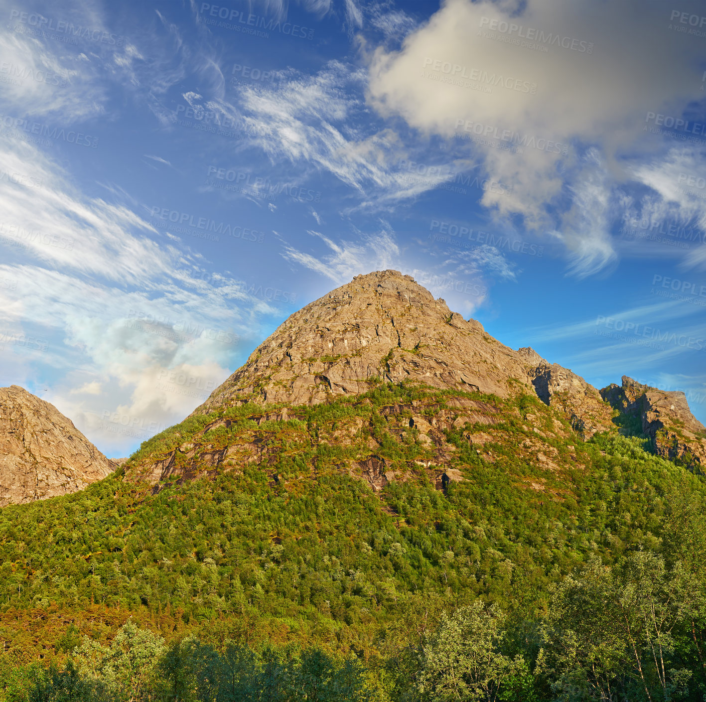 Buy stock photo Landscape of mountains north of the polar and arctic circle in Norway. Scenic view of rolling hills in remote area with clouds in cold winter. Traveling abroad and overseas for holiday and vacation