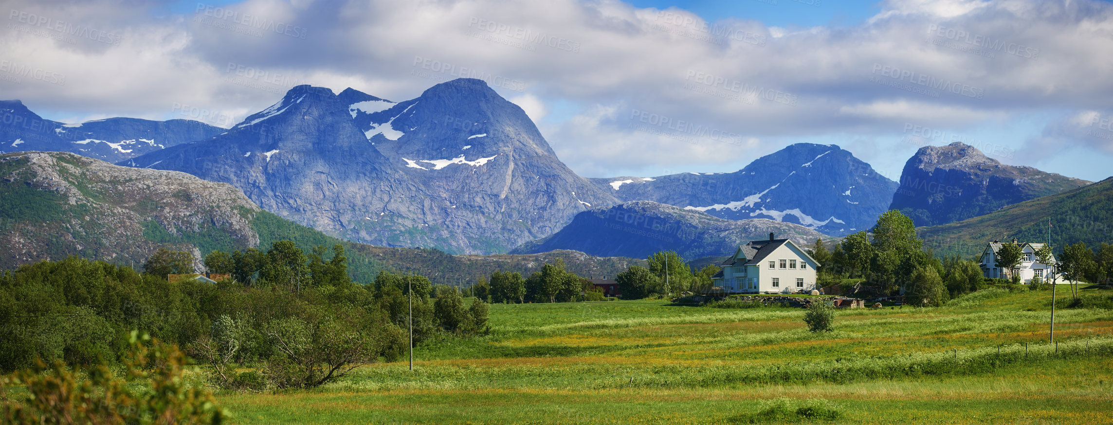 Buy stock photo Landscape, countryside and nature with mountain, farm and green trees in Norway for eco friendly. Environment, earth and field with grass, blue sky and plants for travel, ecology or sustainability