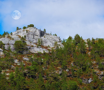 Buy stock photo Landscape, countryside and nature with mountain, trees and rocks or dirt in Norway for eco friendly. Environment, earth and green with grass, blue sky and plants for travel, ecology or sustainability