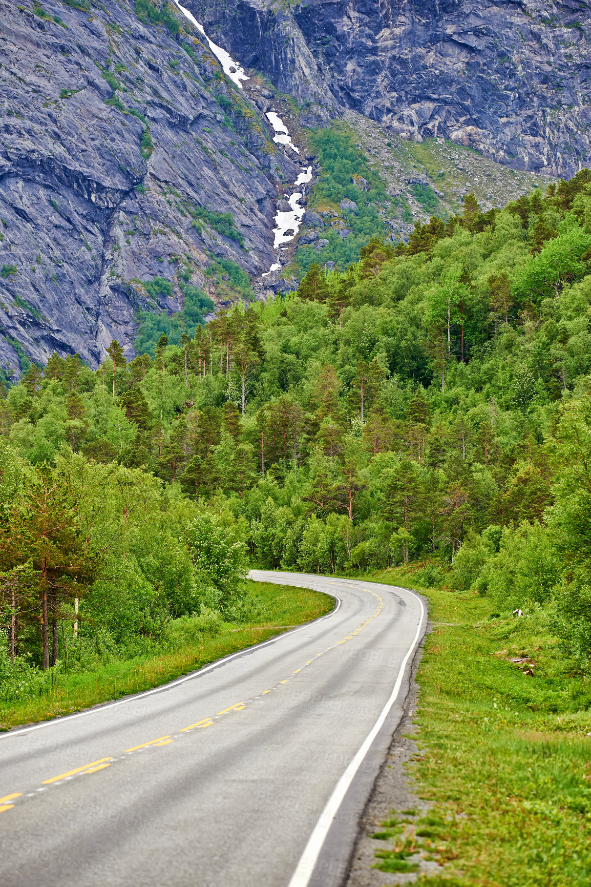 Buy stock photo Mountain pass, road and view with route to nature destination for remote holiday or vacation. Earth, forest and travel with asphalt street in ecosystem for journey or trip to wilderness location