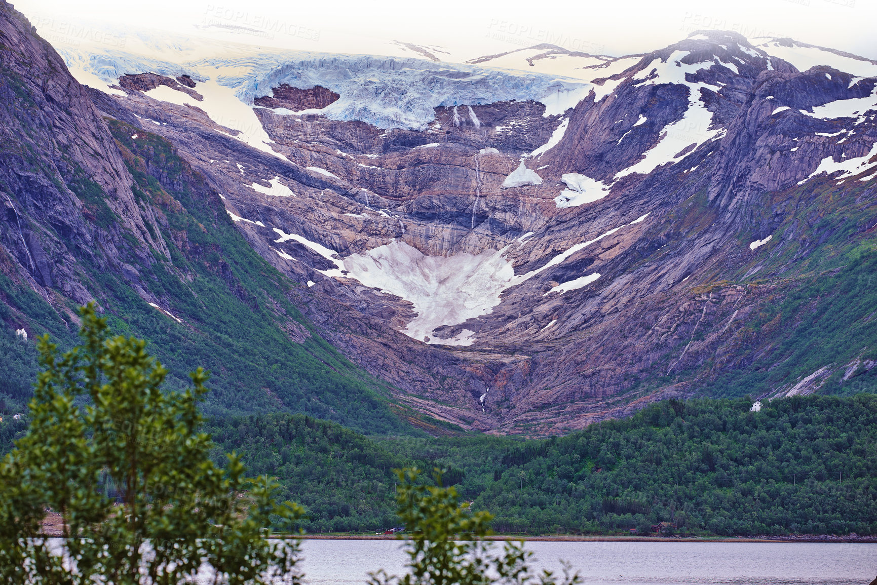 Buy stock photo Trees, nature or forest by mountain with ice in environment for travel by river in Norway. Woods, snow glacier or landscape for winter vacation or holiday by lake in countryside outdoor on background