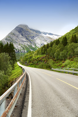 Buy stock photo Road, mountains and nature for travel, journey and tourism with snow melting in spring, environment and landscape. Highway for outdoor getaway, adventure and holiday or vacation destination in Europe