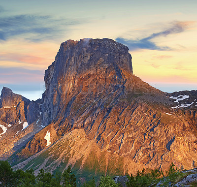 Buy stock photo Mountain landscape north of the polar and arctic circle in Norway. Scenic view of snowcapped hills in remote area with clouds in cold winter. Traveling abroad and overseas for holiday and vacation