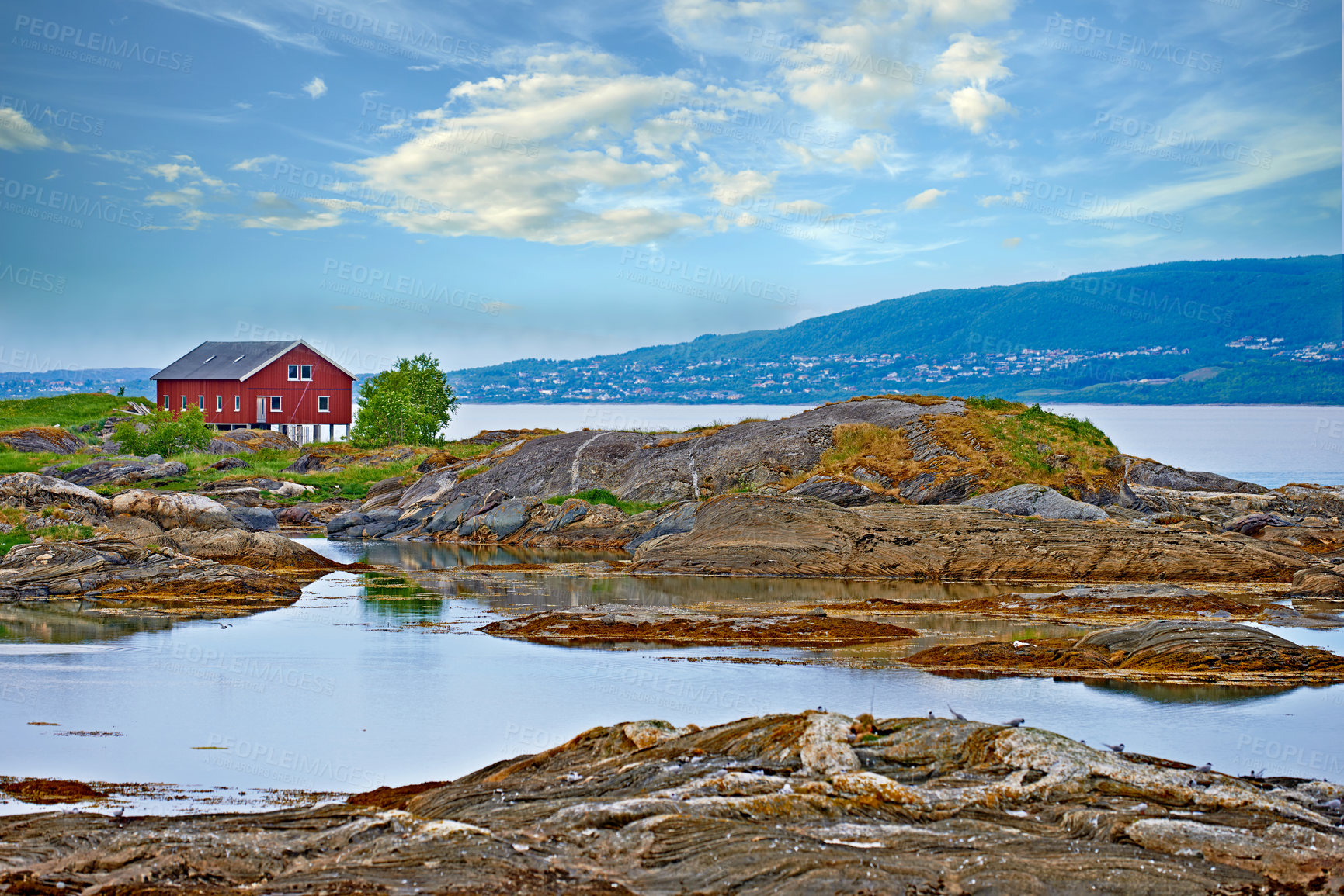 Buy stock photo House, water or landscape of mountains with natural environment or countryside in Norway. Zen lake, calm peace or scenic view of Europe in remote area for outdoor travel, holiday and vacation break