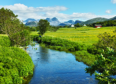 Buy stock photo Landscape, countryside and nature with mountain, river and green trees in Norway for eco friendly. Environment, earth and water with grass, blue sky and plants for travel, ecology or sustainability