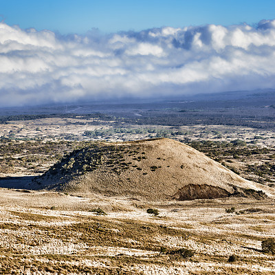 Buy stock photo Desert, volcano and clouds in blue sky in nature with eco friendly, travel and tourism location. Landscape, Mauna Loa and wilderness for sightseeing destination on vacation or holiday in Hawaii.