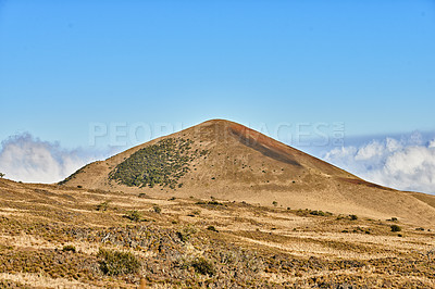 Buy stock photo Landscape, volcano and clouds in blue sky in nature with eco friendly, travel and tourism location. Desert, Mauna Loa and wilderness for sightseeing destination on vacation or holiday in Hawaii.