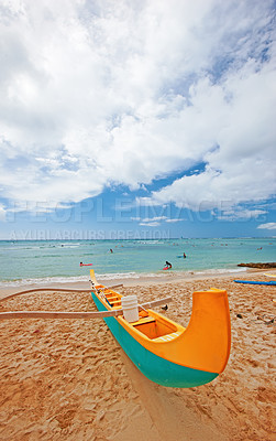 Buy stock photo Beach, transport and boat on sand for adventure, summer vacation and blue sky with clouds. Island paradise, tropical and colorful canoe by ocean for holiday break, water travel and horizon in Hawaii