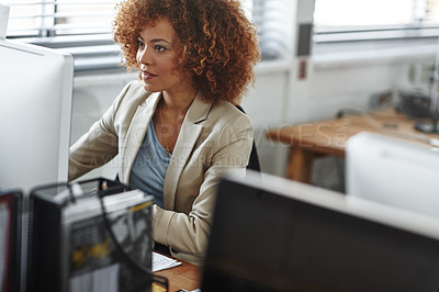 Buy stock photo Cropped shot of a beautiful young businesswoman sitting in her office