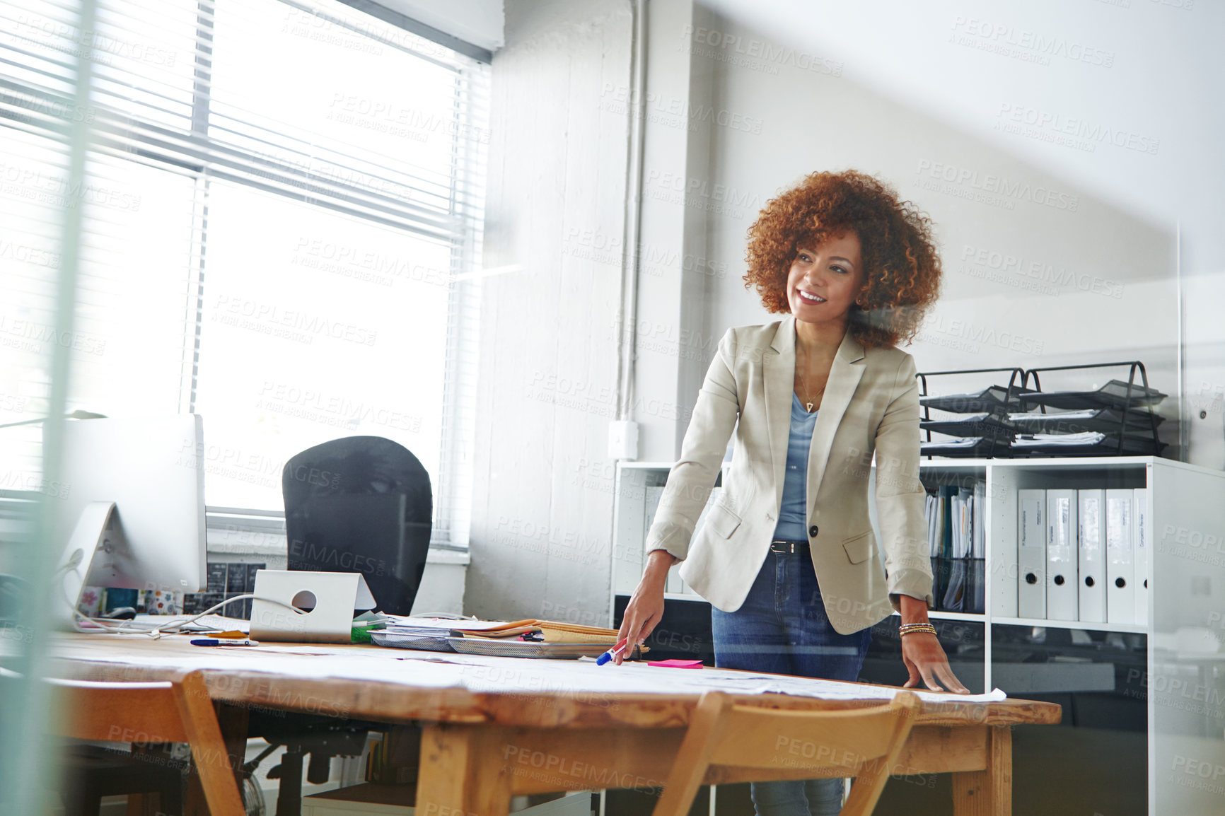 Buy stock photo Cropped shot of a beautiful young businesswoman in her office