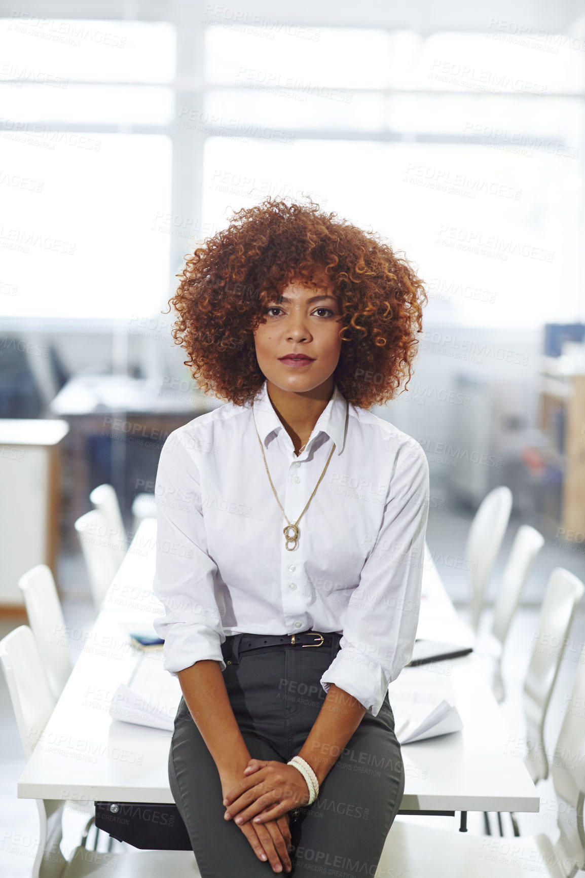 Buy stock photo Cropped shot of a beautiful young businesswoman in her office