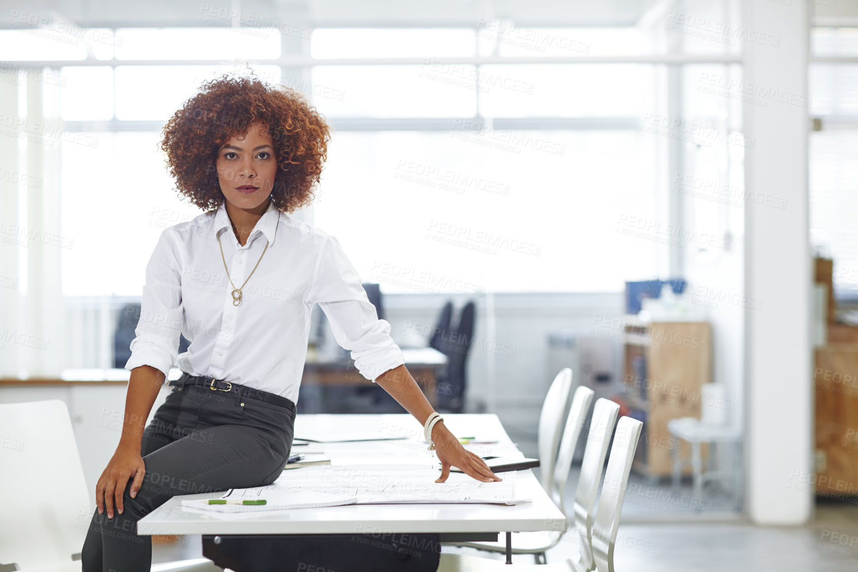 Buy stock photo Cropped shot of a beautiful young businesswoman in her office