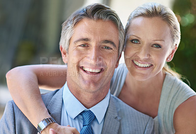 Buy stock photo Portrait of a smiling mature business couple