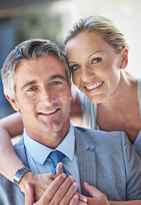 Buy stock photo Portrait of a smiling mature business couple