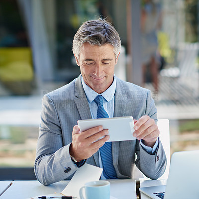 Buy stock photo Tablet, smile and businessman at cafe window checking email, online schedule or research notes. Reading, scroll and happy man at table in coffee shop with digital app, tech and planning for business