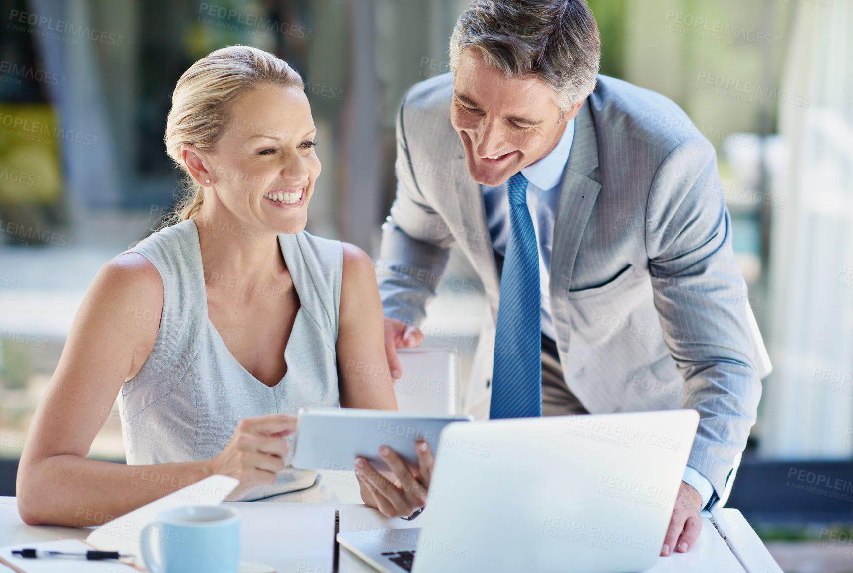 Buy stock photo Happy, research and teamwork with business people and tablet for corporate governance, advisor and meeting. Tax compliance, partner and online report with mature man and woman for shareholder policy