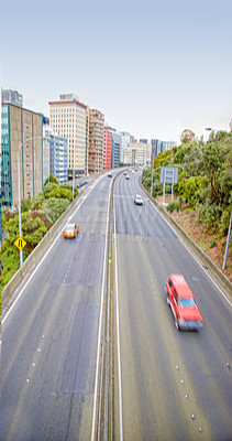 Buy stock photo Blur, city and cars on road for travel, speed and urban buildings outdoor in Los Angeles. Motion, highway and street with fast transport, architecture or infrastructure on landscape with aerial view