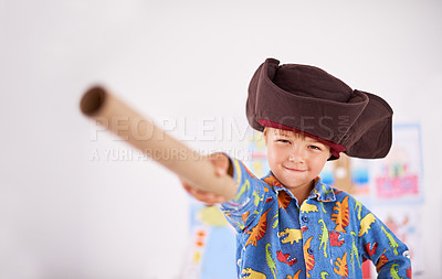 Buy stock photo Boy, pointing and pirate hat with portrait in house for playing, adventure and game as creativity. Child, showing and tricorn with telescope in home for fun, journey and activity as imagination