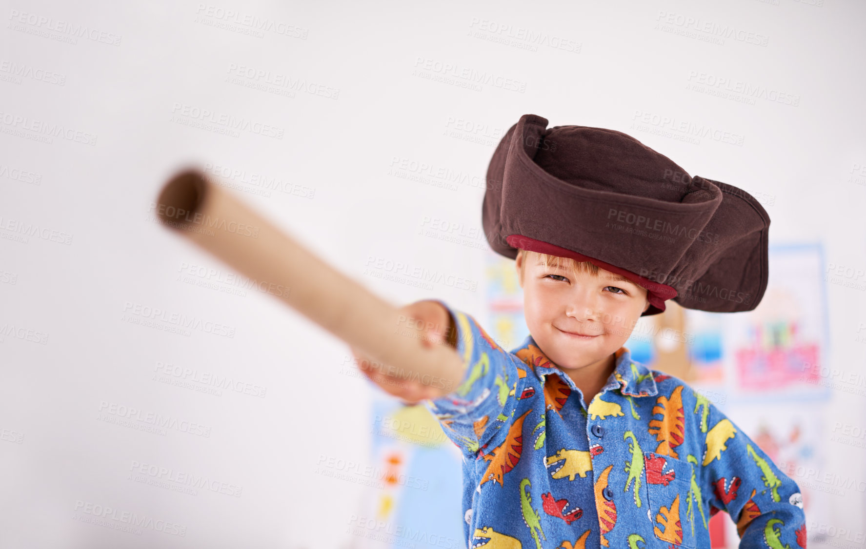 Buy stock photo Boy, pointing and pirate hat with portrait in house for playing, adventure and game as creativity. Child, showing and tricorn with telescope in home for fun, journey and activity as imagination