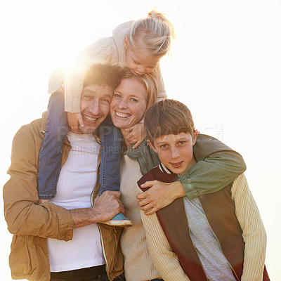 Buy stock photo Family, portrait and smile with sunrise, walk and field for morning exercise and bonding. Parents, children and countryside for health, wellness or outdoor adventure at sunset for holiday or vacation