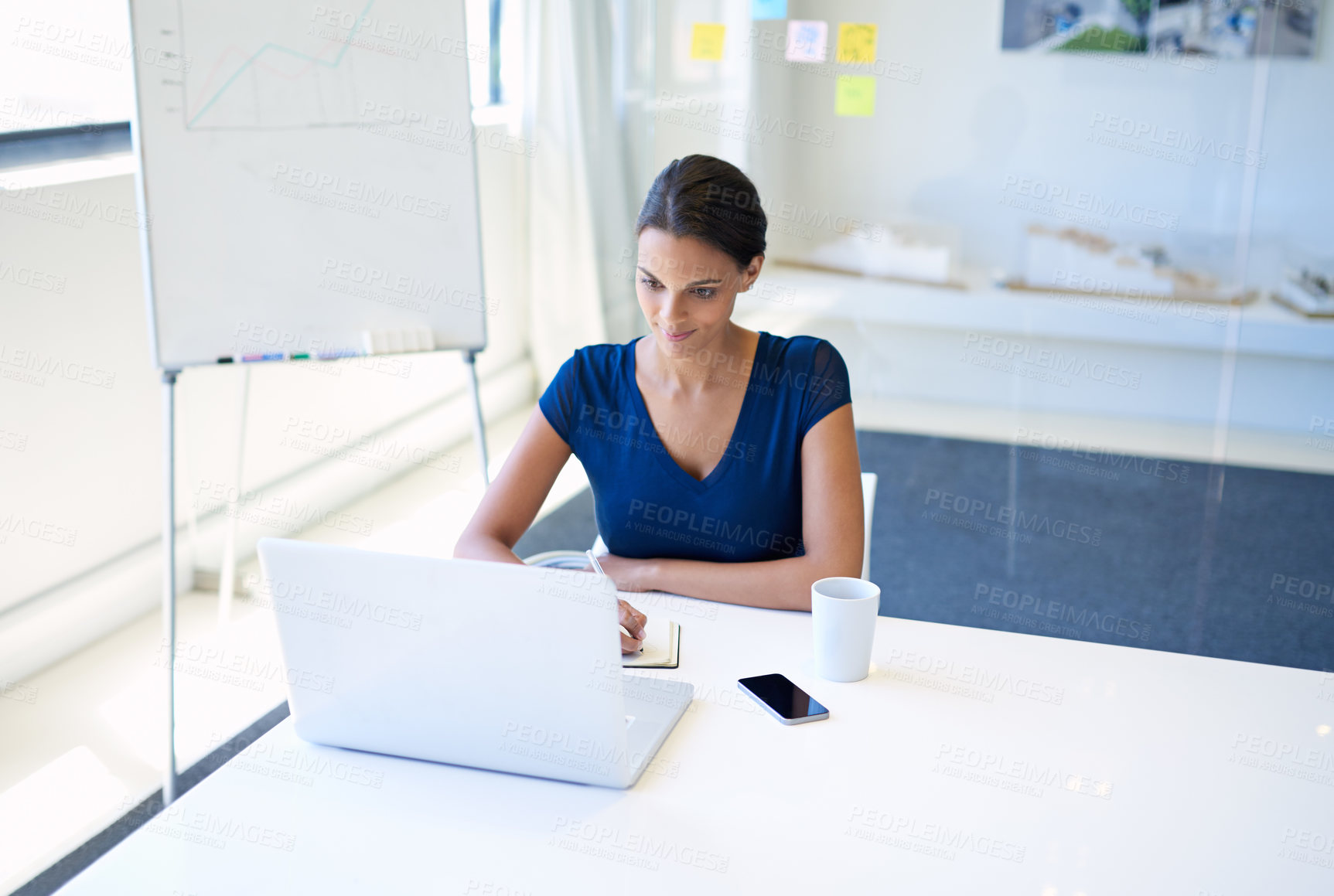 Buy stock photo Office, laptop and business woman with notebook for investment information, research and career. Workplace, female person and financial analyst with digital for corporate growth, reminder or schedule